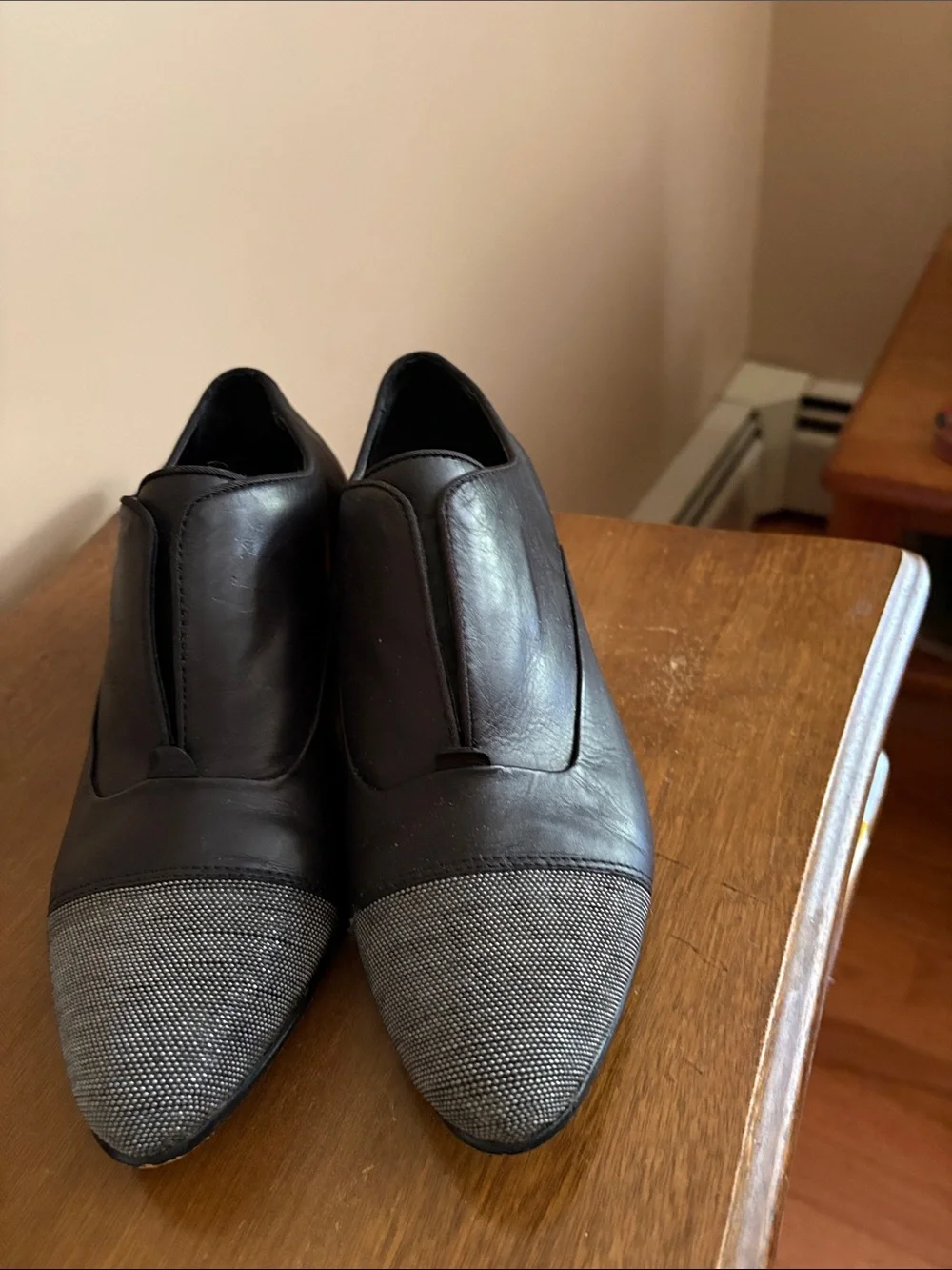 Women’s Dolce vita slip on with black leather and silver toe